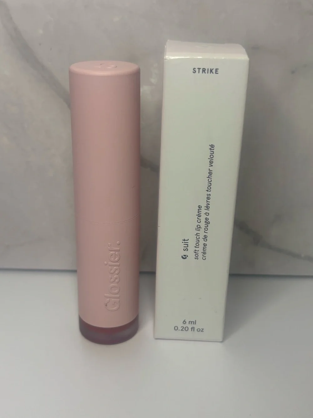 Glossier suit soft